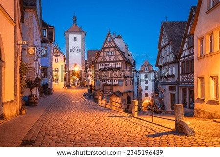 Dusk's Charm - Strolling Through the Beauty of a Medieval Old Town of Rothenburg ob der Tauber, Germany Stock fotó © 