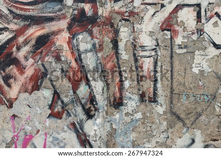 BERLIN, APRIL 01: Graffiti at the East Side Gallery on April 01, 2015 in Berlin, Germany. The East Side Gallery is the longest preserved stretch of the Berlin wall.