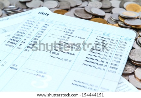 coins on bank account book