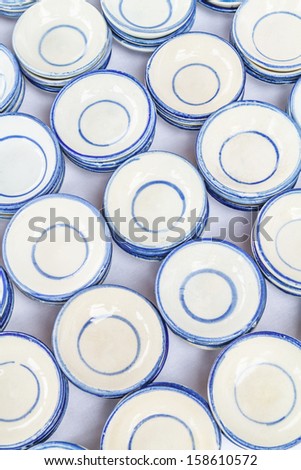 stack of small chinese ceramic dish background