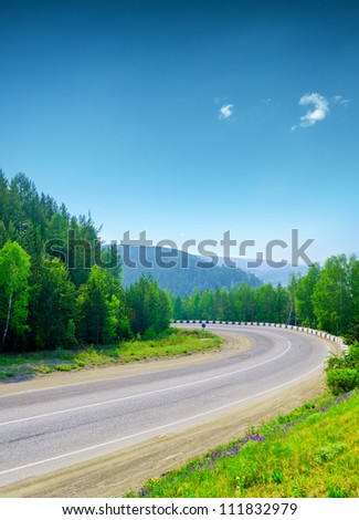 Mountain road and blue sky.