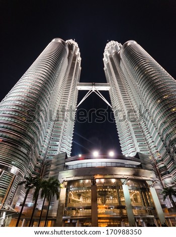 KUALA LUMPUR, MALAYSIA - DECEMBER 31, 2010: Night view of Petronas Twin Towers in Kuala Lumpur. Currently the Petronas are the tallest twin towers in the world.