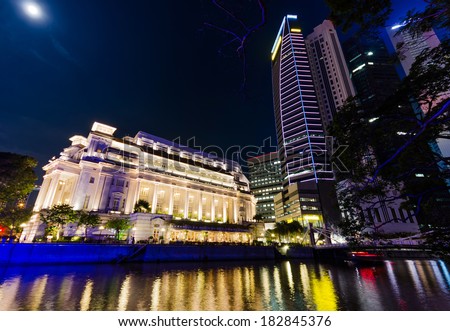 SINGAPORE - APRIL 7, 2011: View of Marina Bay in Singapore. Night Scene. Marina Bay is famous destination in Singapore.