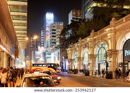 HONG KONG - JANUARY 31, 2015: Luxury elite stores on streets of night city. Hong Kong is popular tourist destination of Asia and leading financial centre of the world.