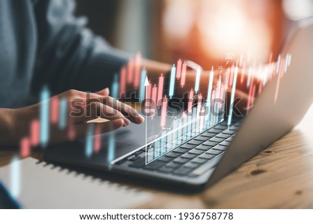 business finance technology and investment concept. Stock Market Investments Funds and Digital Assets. businessman analyzing forex trading graph financial data. Business finance background.