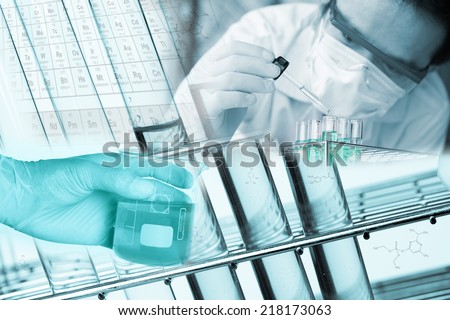 Test tubes closeup,medical glassware. Man wears protective goggles