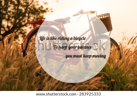 life quote. Inspirational quote by Albert Einstein on beautiful landscape image with Bicycle  at sunset