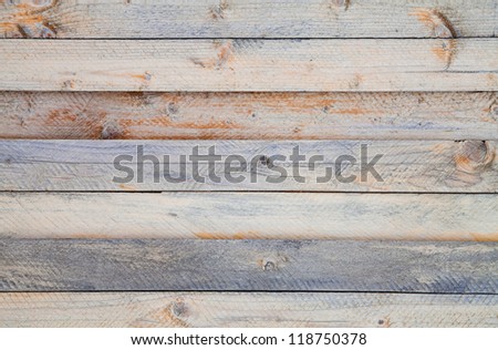 A wall of pine boards, placed horizontally