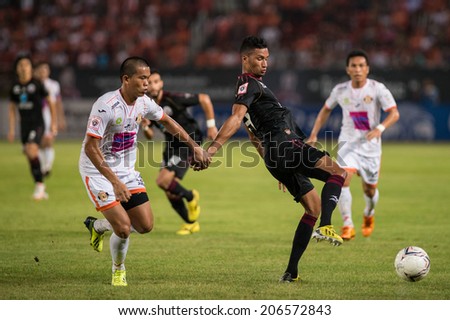 PATHUMTHANI THAILAND-Jul19:Michael Murcy(B) of Police Utd.during the Thai Premier League between Police United and Sisaket FC at Thammasat Stadium on July19,2014,Thailand