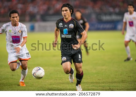 PATHUMTHANI THAILAND-Jul19:Tanapat Na Tarue(B) of Police Utd.run with the ball during the Thai Premier League between Police United and Sisaket FC at Thammasat Stadium on July19,2014,Thailand