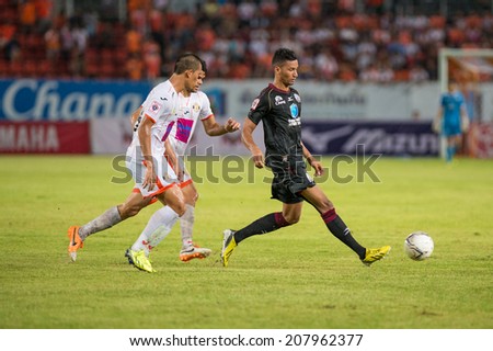PATHUMTHANI THAILAND-Jul19:Michael Murcy(B) of Police Utd.in action during the Thai Premier League between Police United and Sisaket FC at Thammasat Stadium on July19,2014,Thailand