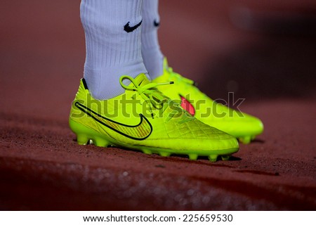 BANGKOK THAILAND-Oct15:Detail of soccer cleats during a match Thai Premier League Between Army Utd F.C.and Chonburi F.C.at Royal Thai Army Stadium on October15,2014 in Thailand