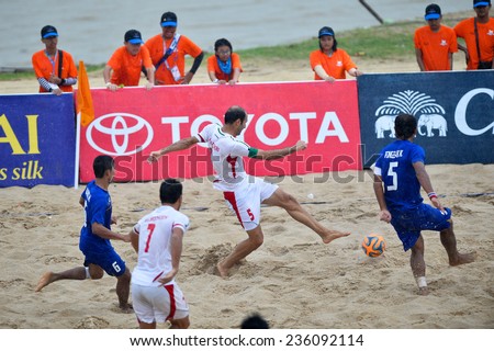 PHUKET THAILAND-NOV19:NADERI HOSSEINABADI Ali#5 of Iran compete for the ball during Beach Soccer match between Iran and Thailand the 2014 Asian Beach Games at Saphan Hin on November19,2014 in Thailand