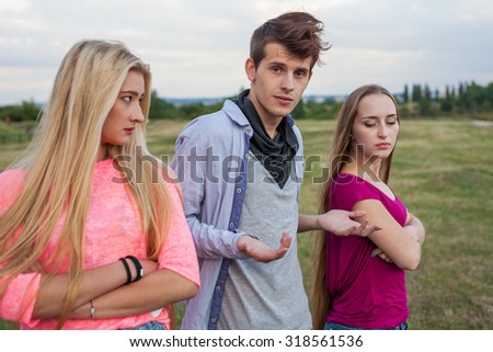 Three friends in park after huge fight