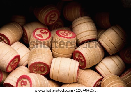 Lotto. Wooden kegs in a sack.