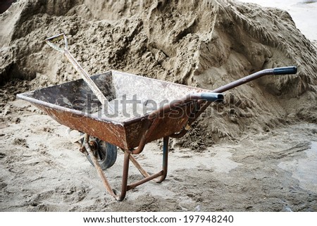 wheelbarrow to work area at a building site