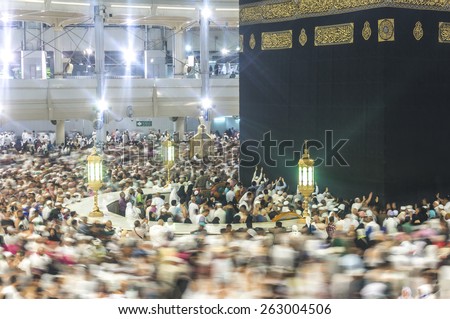 MECCA - MAR 11 : Muslims pray inside Hijr Ismail of Kaaba at Masjidil Haram Mosque on March 11, 2015 in Mecca. Muslims all around the world face the Kaaba during prayer time.