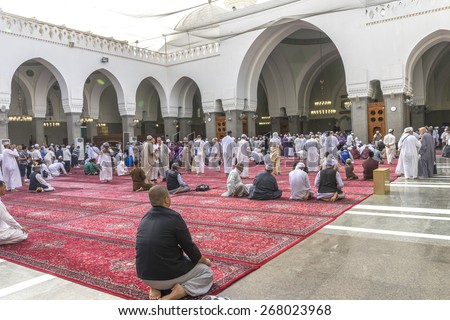 MEDINA, SAUDI ARABIA - MAR 07 : Muslims pray inside Masjid Quba March 07, 2015 in Medina, Saudi Arabia. This is the first mosque built by Prophet Muhammad (pbuh) in Islam