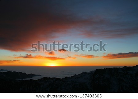 High mountain sea of clouds and sunrise, 5200 meters above sea level