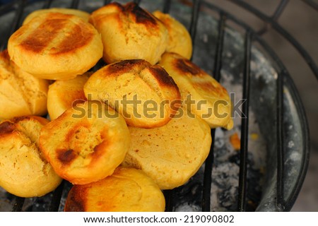 Close up of baked steamed buns on the oven