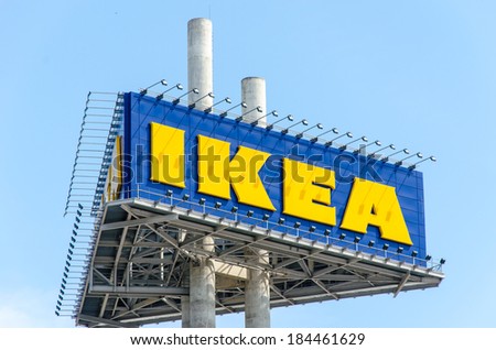BANGKOK - MARCH 30, 2014: IKEA logo on blue sky background in BANGKOK,THAILAND.the Swedish IKEA is the world\'s largest furniture retailer.