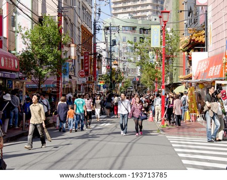 YOKOHAMA, JAPAN - Oct 13 : People shopping in China Town in Oct 13, 2013, being the third largest Chinatown throughout Japan