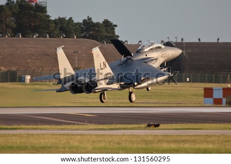 RAF LAKENHEATH, SUFFOLK, UK - AUGUST 21: 492nd Fighter Squadron F-15E Strike Eagle landing on August 21, 2012 at RAF Lakenheath, Suffolk, UK.