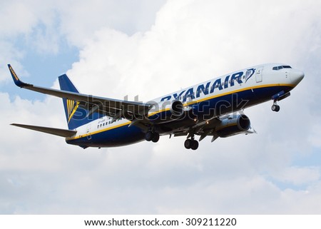 BIRMINGHAM, UK - AUGUST 22: Ryanair Boeing 737 passenger plane (EI-EBI) landing on August 22, 2015 at Birmingham Airport, Birmingham, UK.