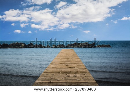 Wooden path and blue sky
