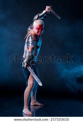 Knight with a sword on a blue smoky background
