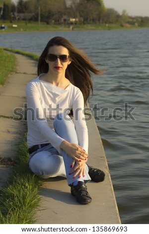 Beauty girl portrait, young fresh woman, face, long hair .  Lake Palic in Vojvodina, Serbia.