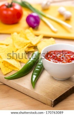 Mexican Nacho Chips and Salsa Dip arrangement on the Table