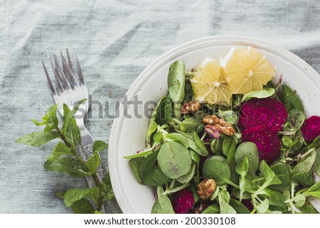Corn salad with beetroot and nuts. Rustic