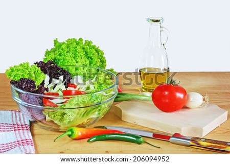 Salad ingredients of various colorful raw vegetables.