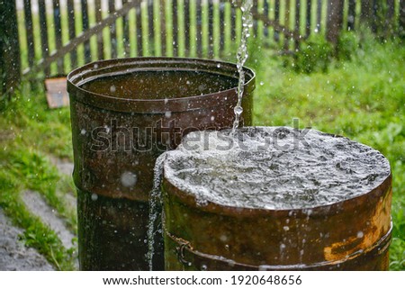 Similar – Image, Stock Photo Metal barrel with wet bottom at factory