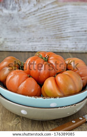 Italian tomatoes. Directly above view of tomatoes in a ceramic bowl.