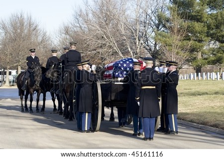 WASHINGTON - JANUARY 14: Caisson with casket for full honors funeral at the Arlington Cemetery on January 14, 2010 in Arlington, VA.