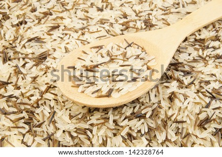 Rice cereal and wooden spoon close up