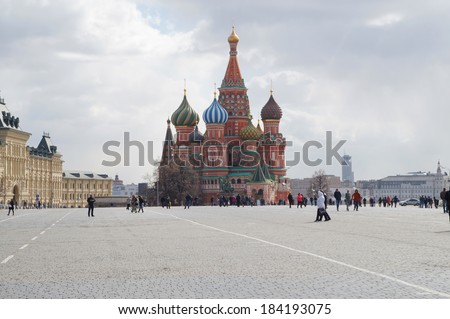 MOSCOW - March 28: Tourists visiting the Red Square on March 28, 2014 in Moscow, Russia. The Red Square and the Kremlin are the main attractions in Moscow.