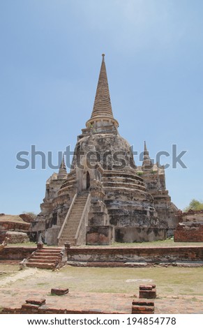 Asian religious architecture. Ancient pagoda at Wat Phra Sri Sanphet temple under blue sky. Ayutthaya, Thailand
