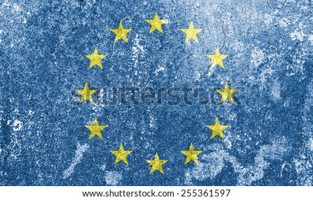 Europe union flag on grunge stone wall background