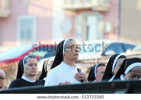 SPLIT, CROATIA - AUG 15: People participates in pageantry for Assumption of Mary (Velika Gospa) on Aug 15, 2012 in Split, Croatia