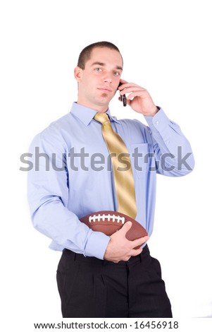 American football manager hold an american football ball