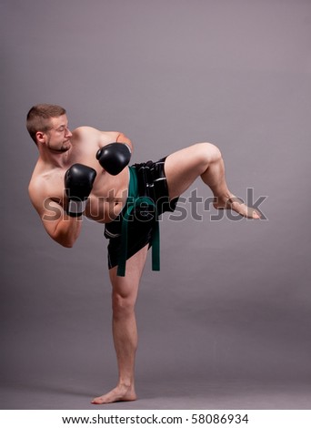 kick-boxer training before fight