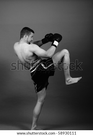 kick-boxer training before fight -monochrome photo