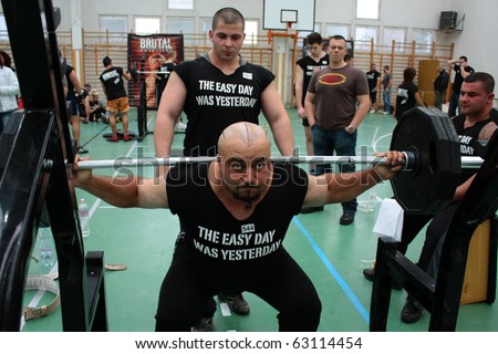 PECS, HUNGARY - OCTOBER 16: Unknown man participates in Brutal Challenge power lifting championship October 16, 2010 in Pecs, Hungary.