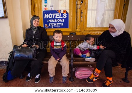 BUDAPEST - SEPTEMBER 7: war refugees waiting for train at Keleti Railway Station on 7 September 2015 in Budapest, Hungary. Refugees are arriving constantly to Hungary on the way to Germany.