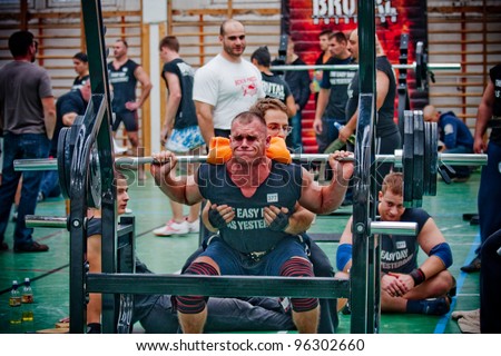 PECS, HUNGARY - OCTOBER 16: Unidentified man participates in Brutal Challenge power lifting championship on October 16, 2010 in Pecs, Hungacry.