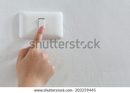 closeup finger press turn on/off electric-switch