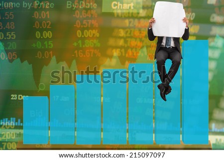 business man reading newspaper on bar graph and stock market board background